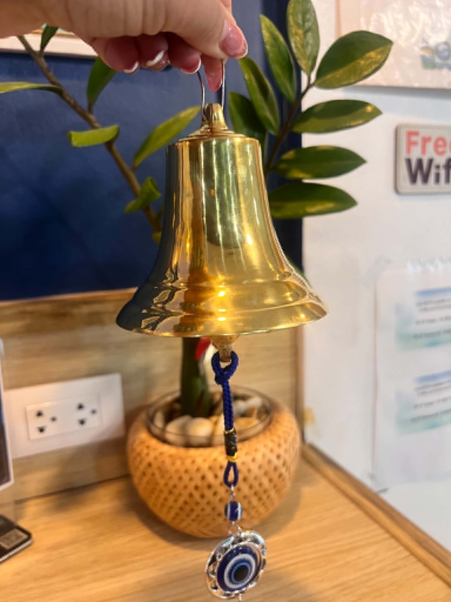 Brass service bell at De Blue Lounge and Bar