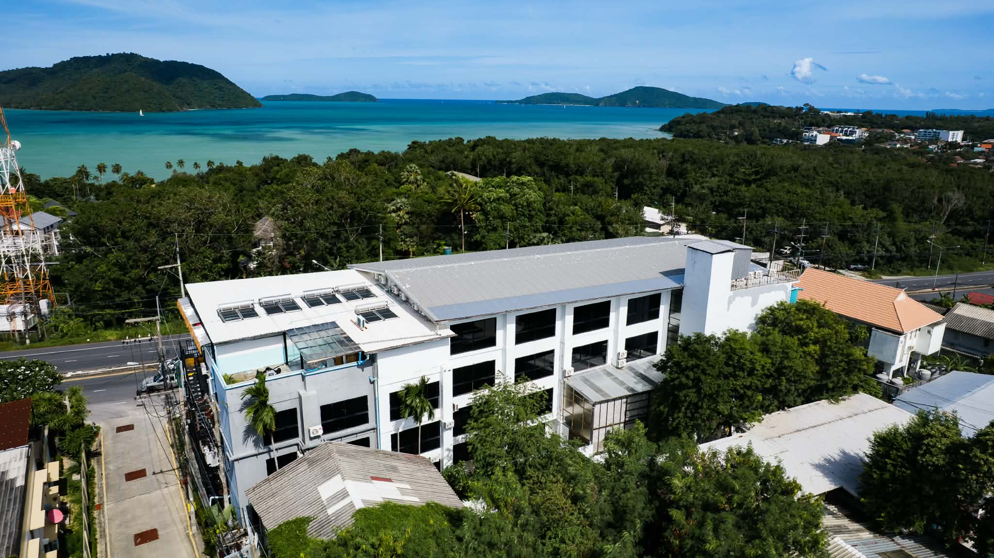 View over the De Blue Sea Rawai Hotel roof to Chalong Bay and the islands