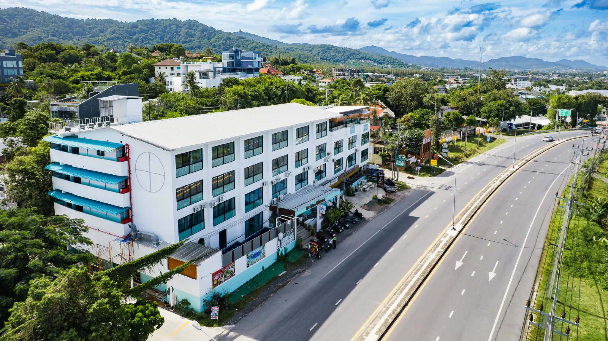 De Blue Sea Rawai Hotel beside Wiset Road, the road to Rawai Beach and Nai Harn